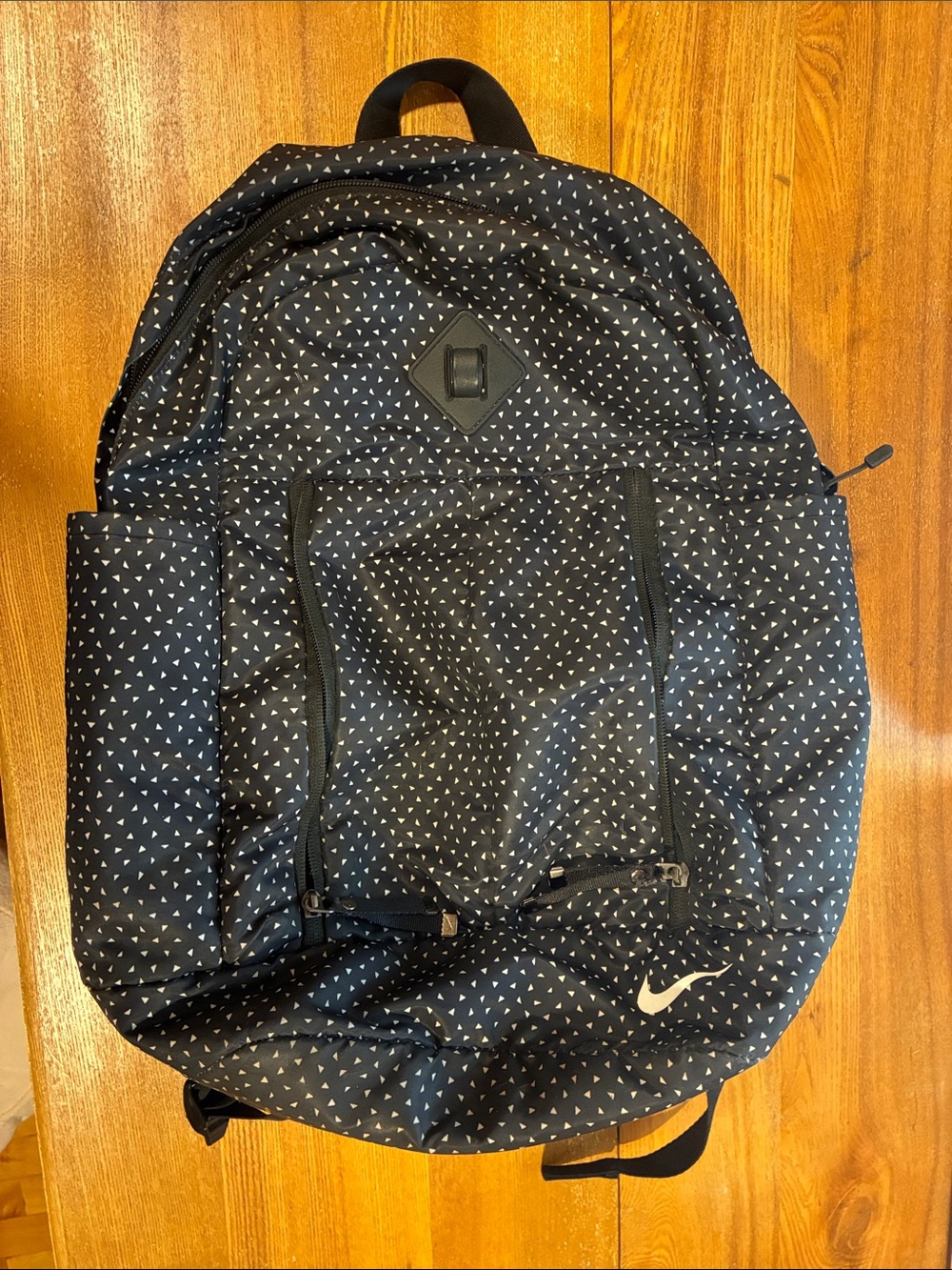 Nike Black Backpack with White Triangle Pattern